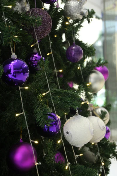 Christmas decorations hanging on christmas tree. — Stock Photo, Image