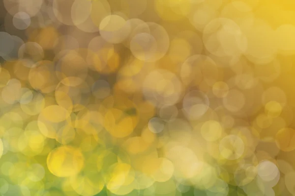 Astratto colore sfocato e sfondo bokeh, verde dorato . — Foto Stock