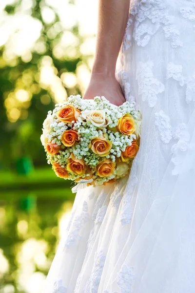 Wedding bridal bouquet of orange roses — Stock Photo, Image