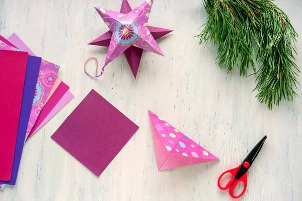 Üçüncü adım. Adım adım talimatlar: renkli kartondan bir noel yıldızı nasıl yapılır. 