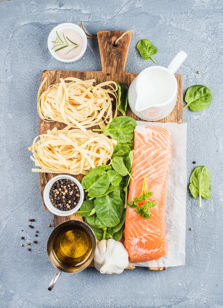 Ingredients for cooking pasta tagliatelle with salmon — Stock Photo, Image
