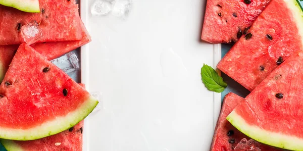 Watermelon slices with ice cubes — Stock Photo, Image