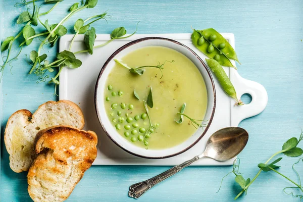 Light summer green pea cream soup — Stock Image Light summer green pea cream soup Stock Image
