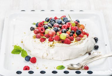 Homemade Pavlova cake with fresh berries clipart