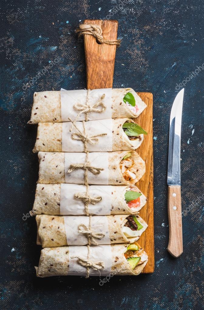 Tortilla wraps with different fillings Stock Photo by ©sonyakamoz 124404280