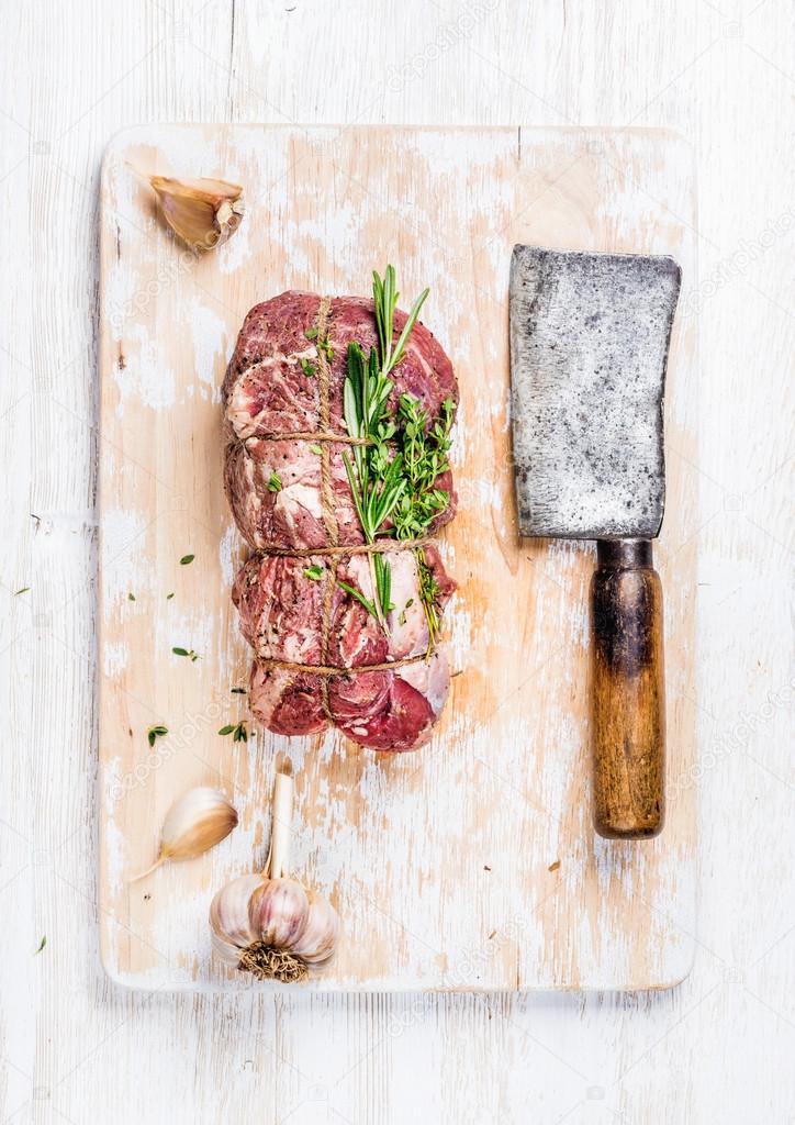 Raw roastbeef meat cut with rosemary