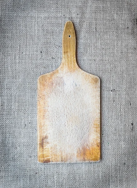 Rustic wooden cutting board — Stock Photo, Image
