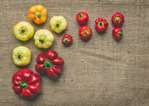 Sweet paprika set over a sackcloth background — Stock Photo, Image