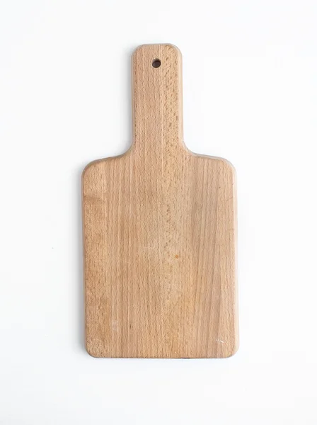 Rustic wooden cutting board on a white background — Stock Photo, Image