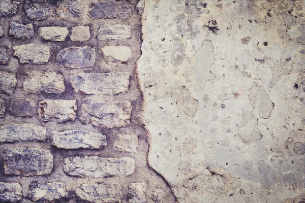 Vieille texture brute de mur de pierre grise — Photo