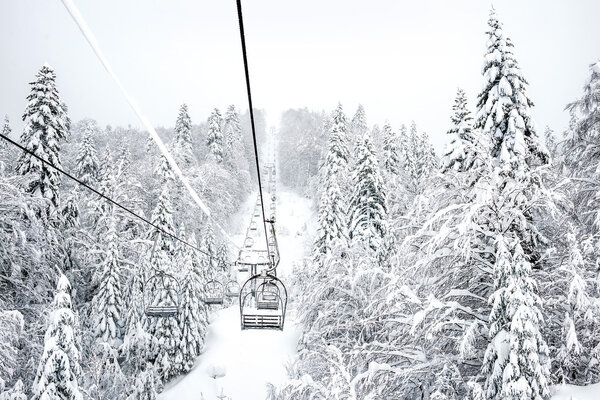 Old cable ski lift with no passangers in 'Kolasin 1450' mountain