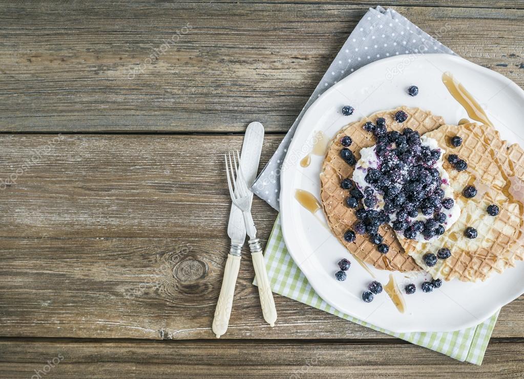 Dutch waffles with cream-cheese, fresh blueberry and maple syrup