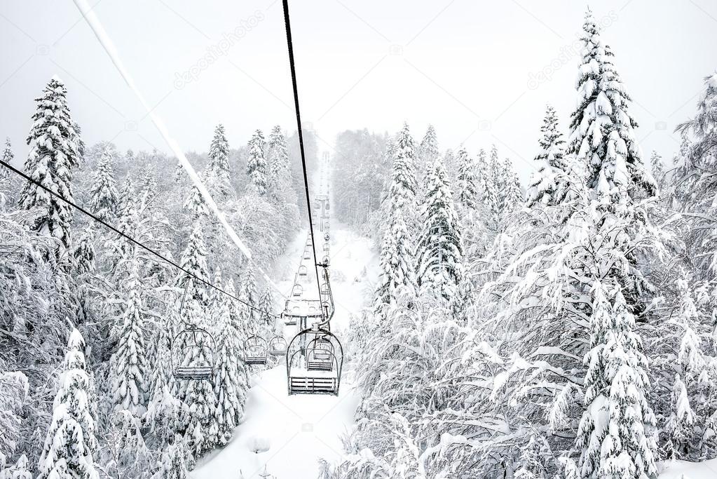 Old cable ski lift with no passangers in 'Kolasin 1450' mountain