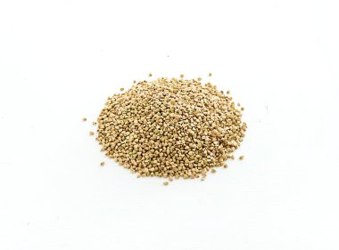 Green raw buckwheat groats on white background