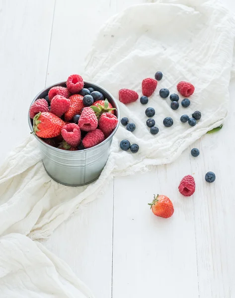 Metal bucket of berries, — Stock Photo, Image