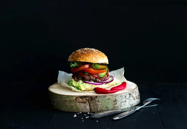 Fresh homemade burger on wooden — Stock Photo, Image