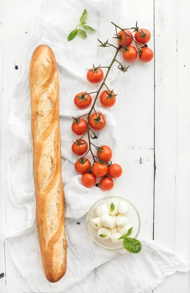 Baguette with banch of cherry-tomatoes