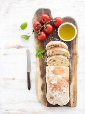 Freshly baked ciabatta bread with cherry-tomatoes