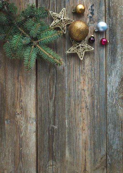 Wooden background with toy decorations — Stock Photo, Image