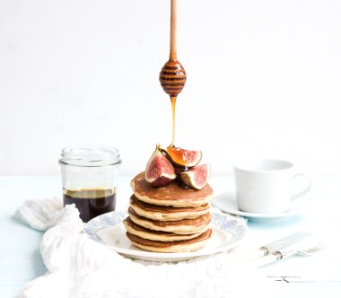 Pancake tower with fresh figs clipart