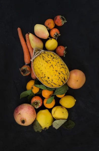 Orange fruits and veggies assortment