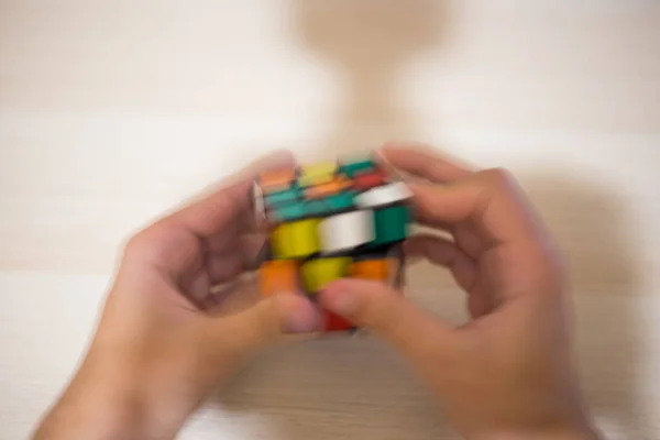 Hand Holds Colored Puzzle Rubik Cube Three Three Lies Wooden — Stock Photo, Image