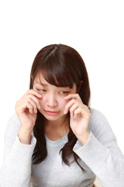 young Japanese woman cries clipart