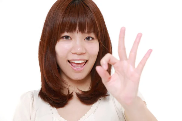 Japanese woman showing perfect sign — Stock Photo, Image