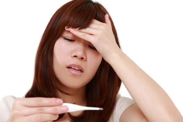 Young woman with fever — Stock Photo, Image