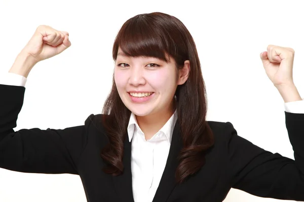 Jeune femme d'affaires japonaise dans une pose de victoire — Photo