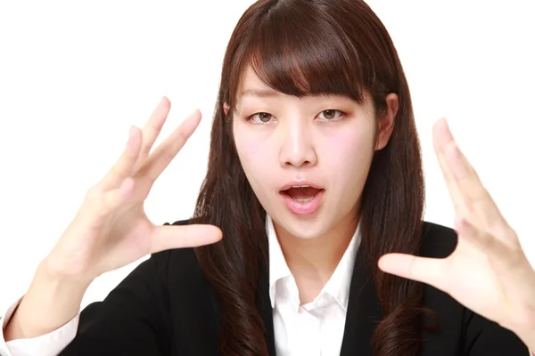 Joven mujer de negocios japonesa con poder sobrenatural — Foto de Stock