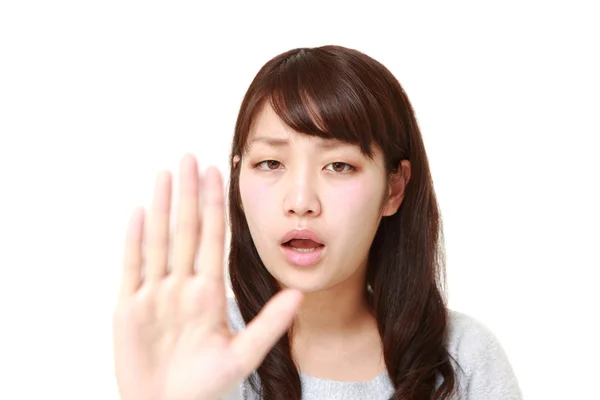 Joven japonesa mujer haciendo stop gesto —  Fotos de Stock