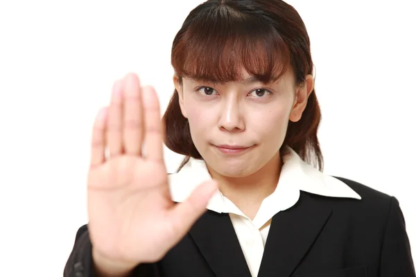 Asiática mujer de negocios haciendo stop gesture — Foto de Stock