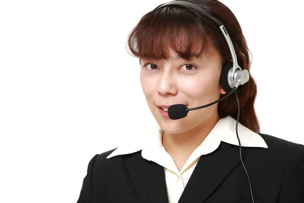 Asiática mujer de negocios de call center con conjuntos de cabeza — Foto de Stock