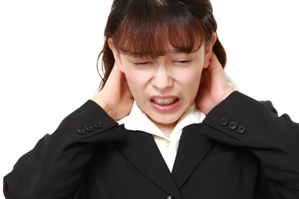 Asian businesswoman suffers from neck ache — Stock Photo, Image