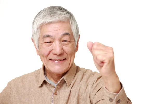 Senior Japanese man in a victory pose — Stock Photo, Image