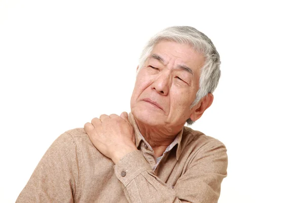 Senior Japanese man suffers from neck ache — Stock Photo, Image