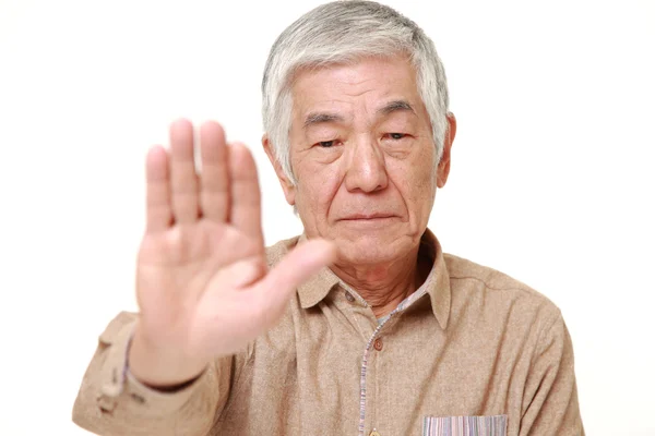 Senior japonés hombre haciendo stop gesture — Foto de Stock
