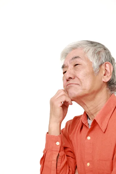 Senior Japanese man worries about something — Stock Photo, Image