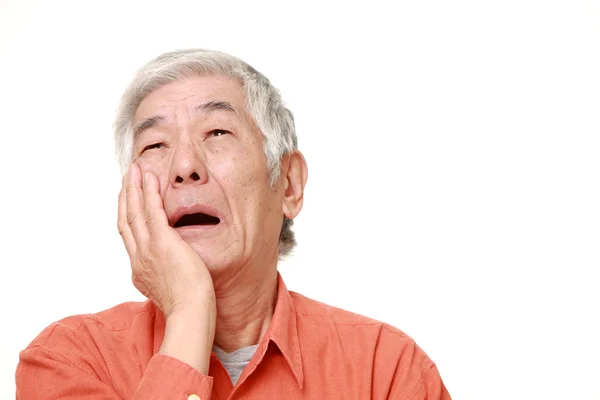 Sênior japonês homem sofre de dor de dente — Fotografia de Stock