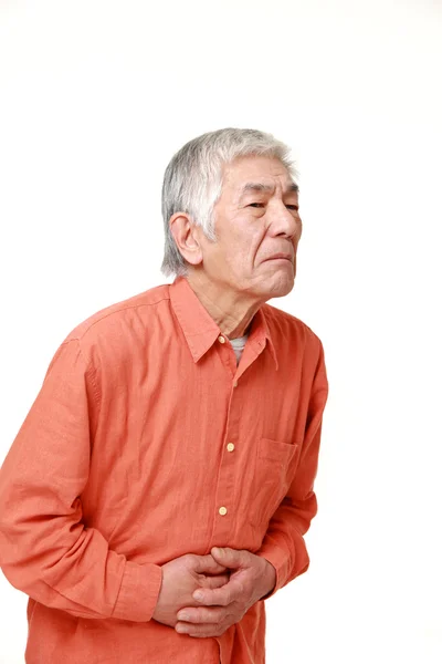Homme japonais âgé souffre de maux d'estomac — Photo
