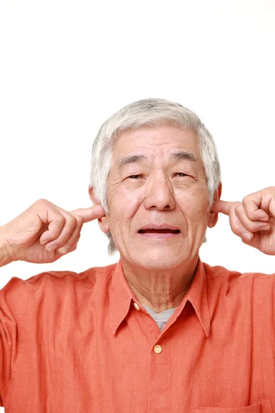 Üst düzey Japon adam gürültü uğrar — Stok fotoğraf