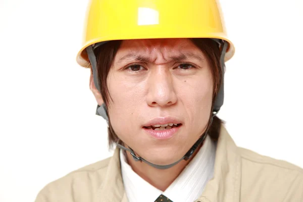 Zmateni mladé japonské stavební dělník — Stock fotografie