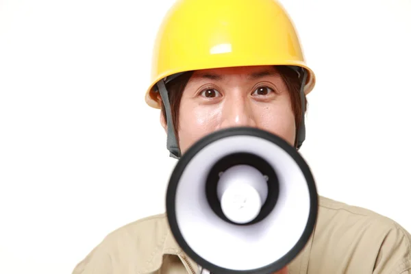 Trabajador de la construcción con megáfono — Foto de Stock