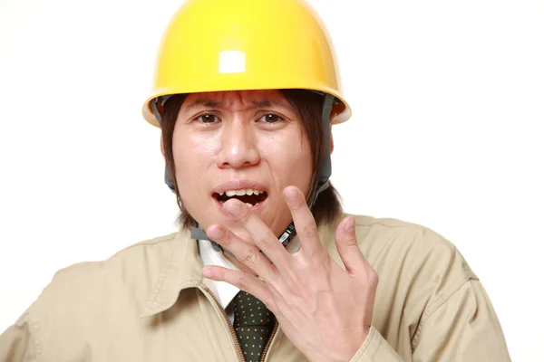 Trabajador de la construcción sorprendido — Foto de Stock