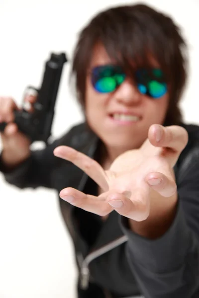 Robber with a handgun — Stock Photo, Image