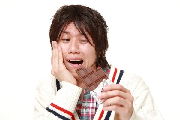 歯痛に苦しんでいる若い日本人男性 — ストック写真