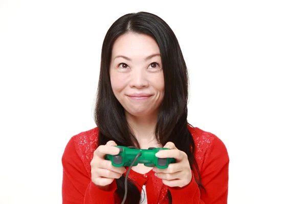 日本女人享受视频游戏 — 图库照片
