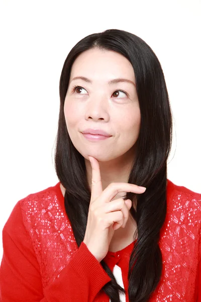 Japonesa mujer piensa en algo — Foto de Stock