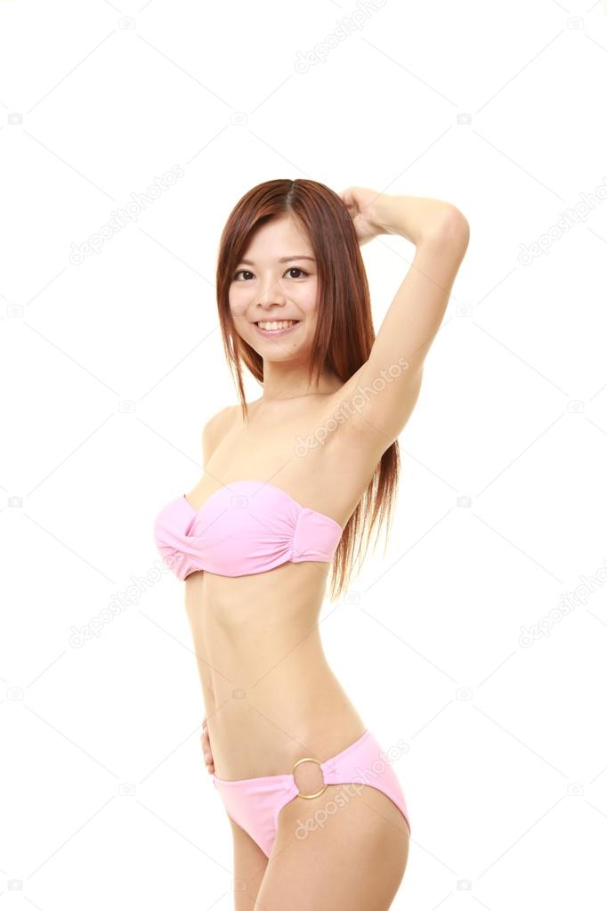 Japanese woman in a pink bikini Stock by 111781628